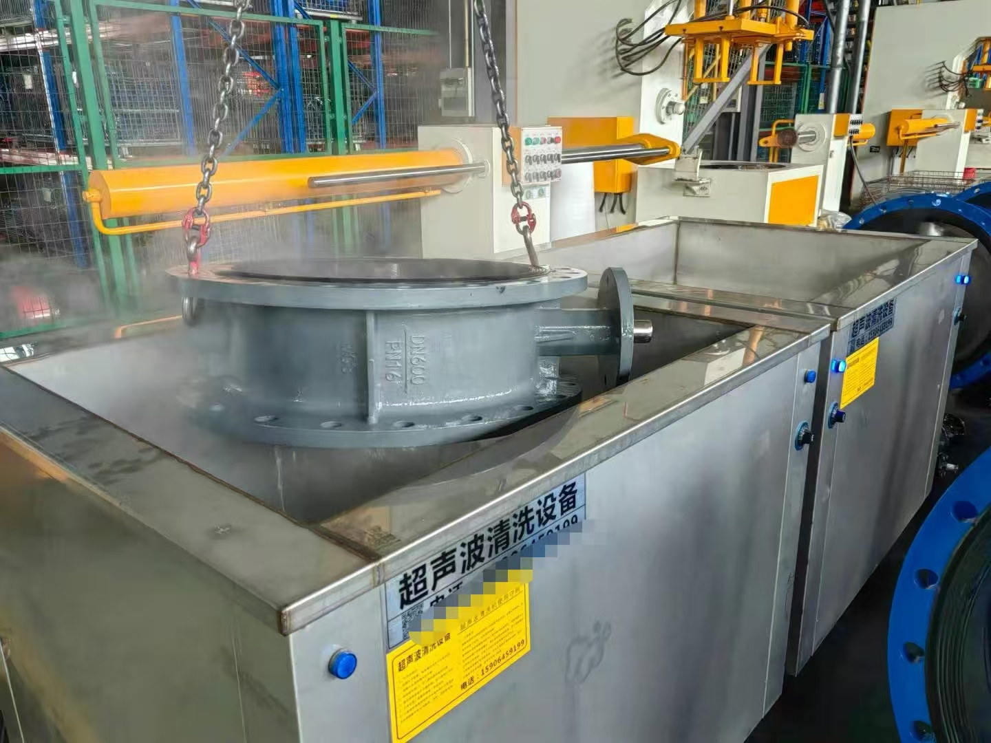 Ultrasonic cleaning of valves after assembly